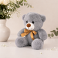 Oso Teddy Gris con Moño Dorado